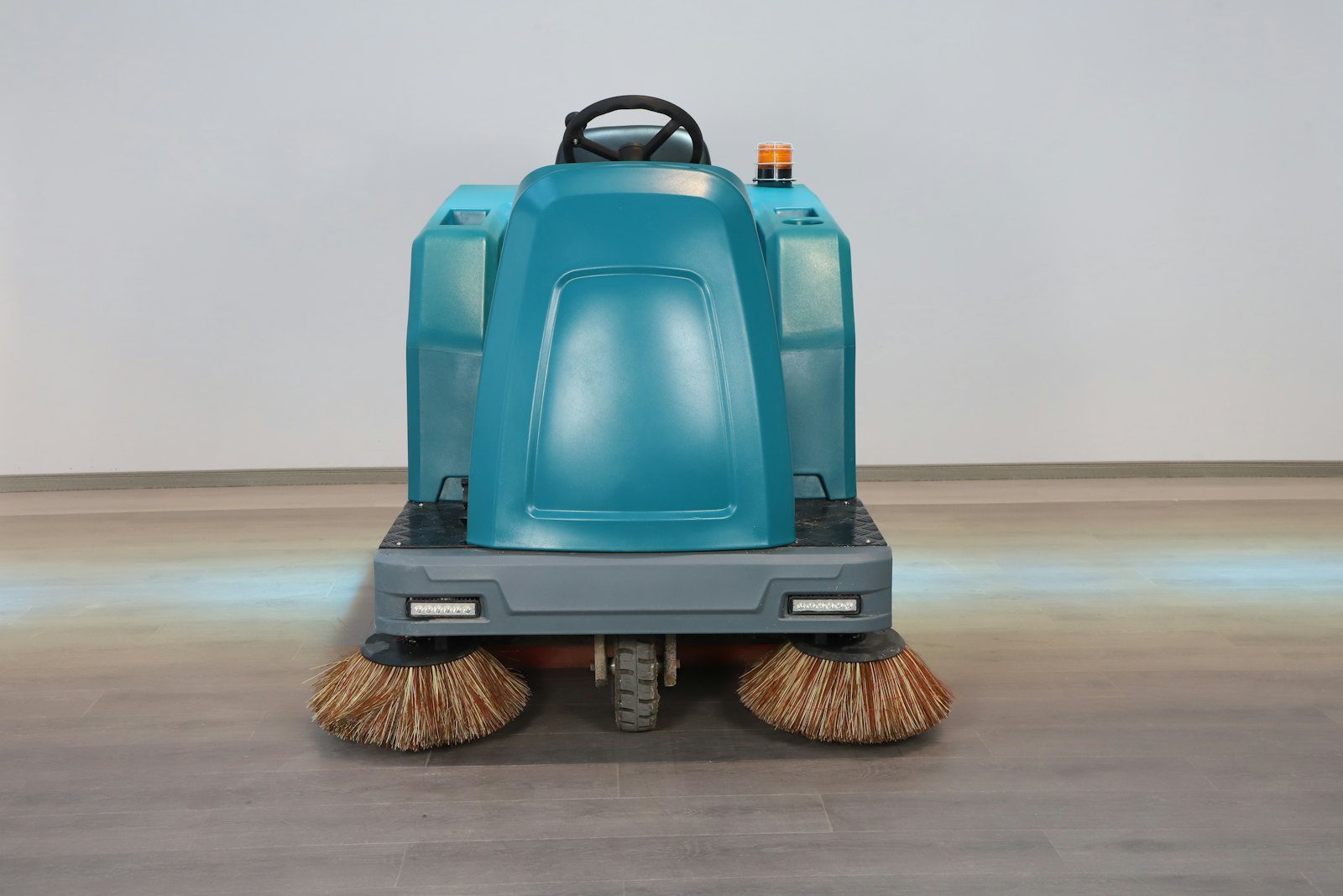 Floor scrubbing machine on a commercial floor